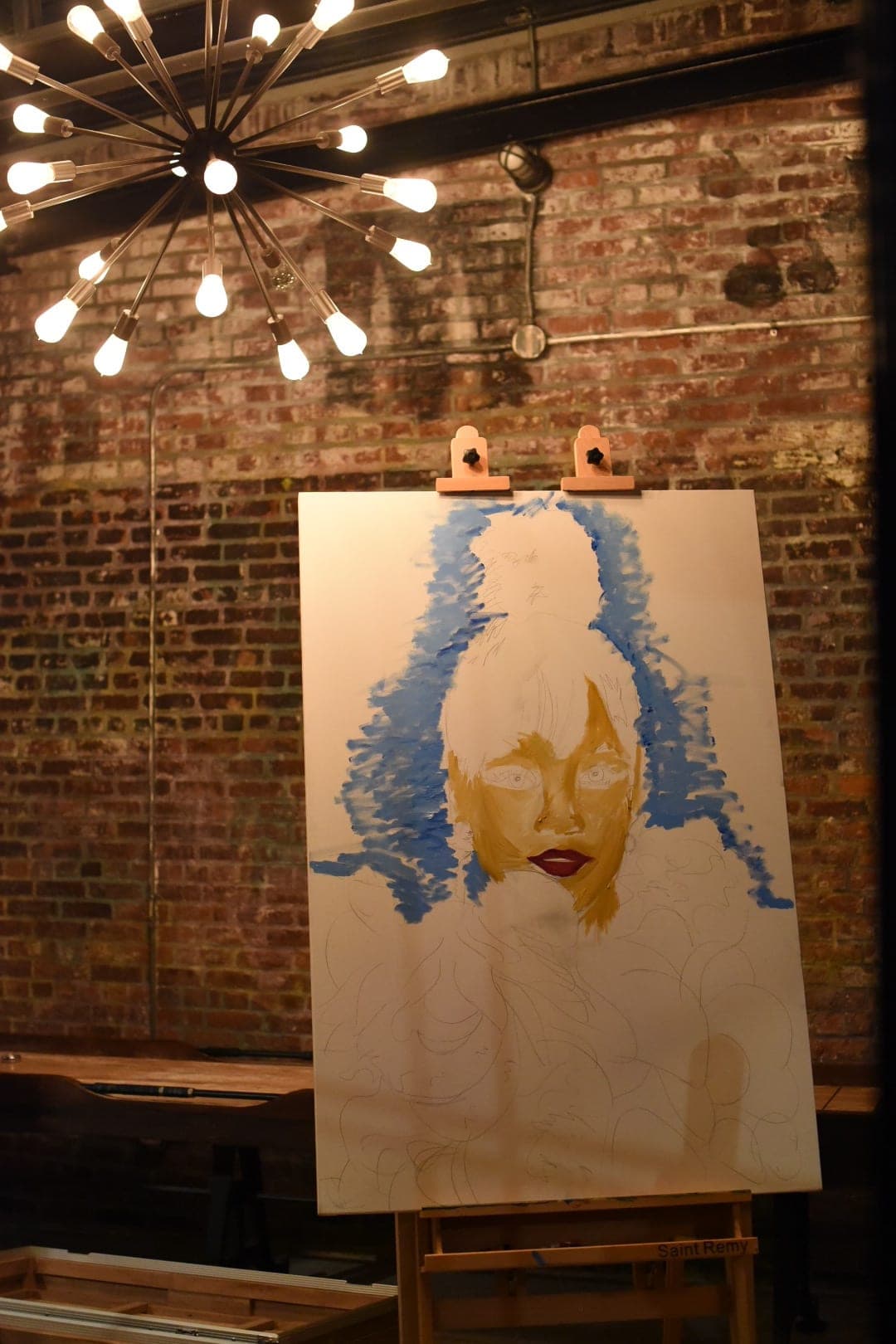 Rihanna portrait work-in-progress sketch on canvas.