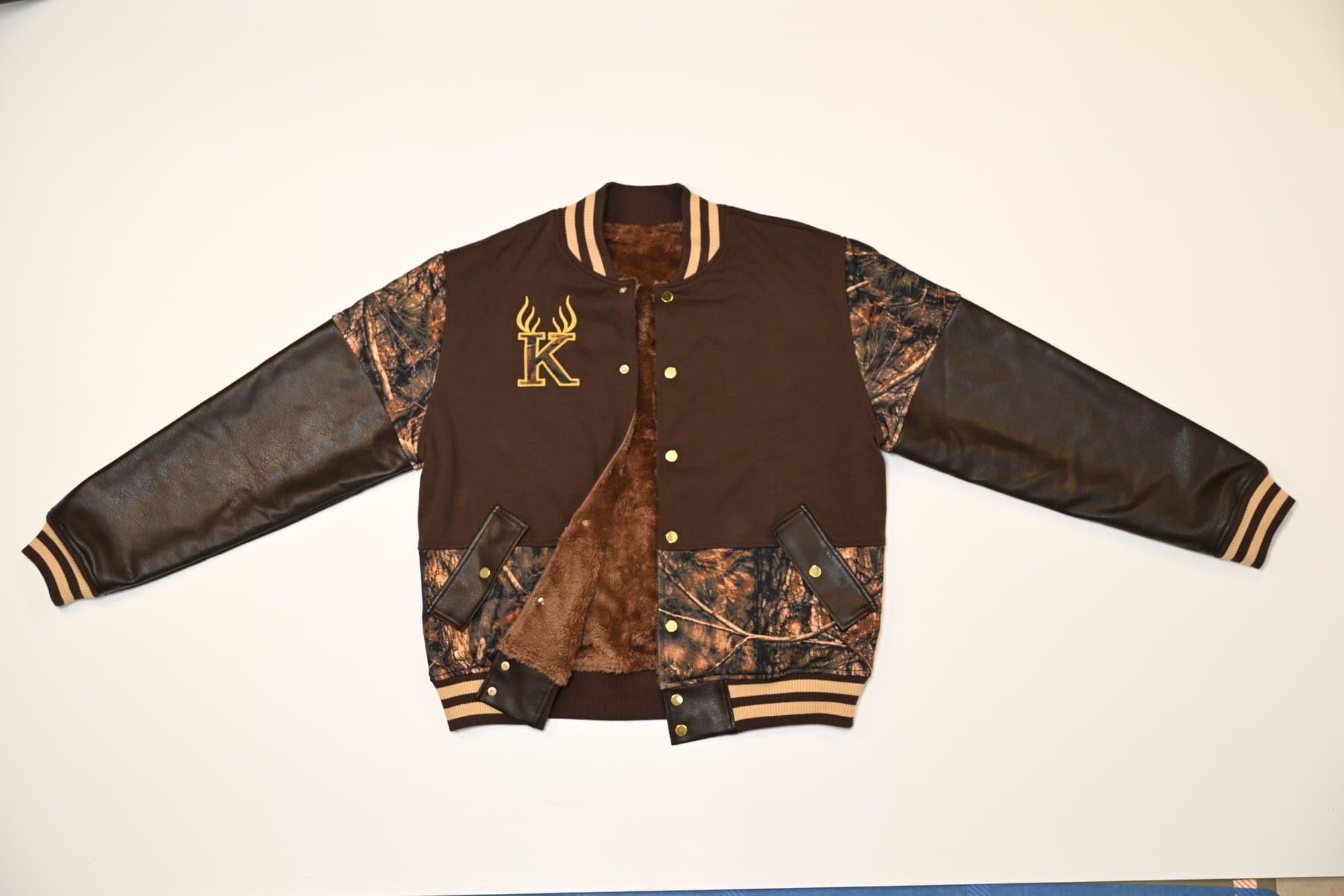 Kamo King varsity jacket back view.