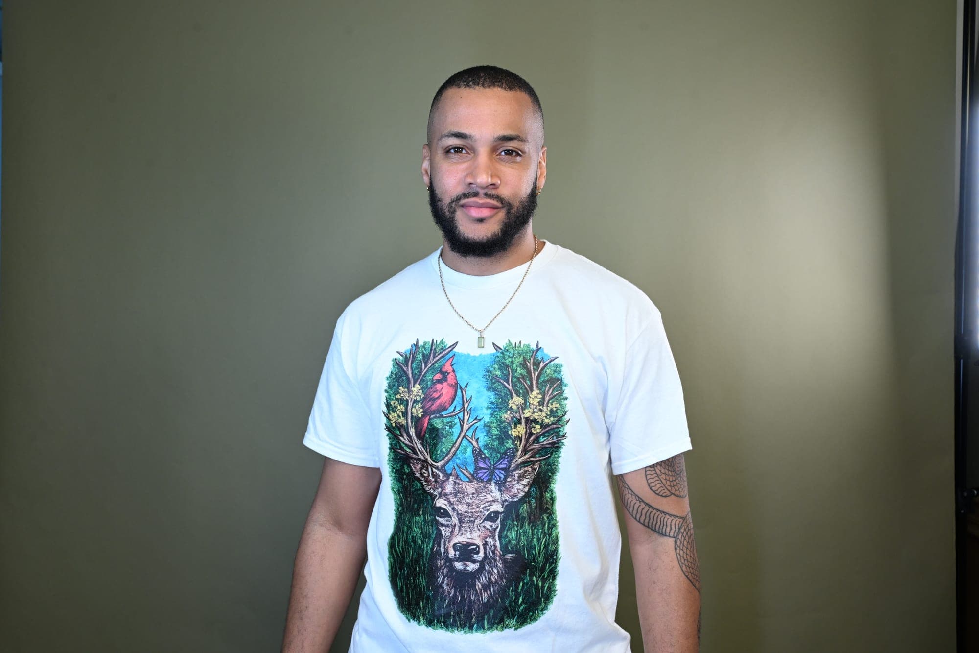 Portrait in Kamo King deer tee, studio lighting.